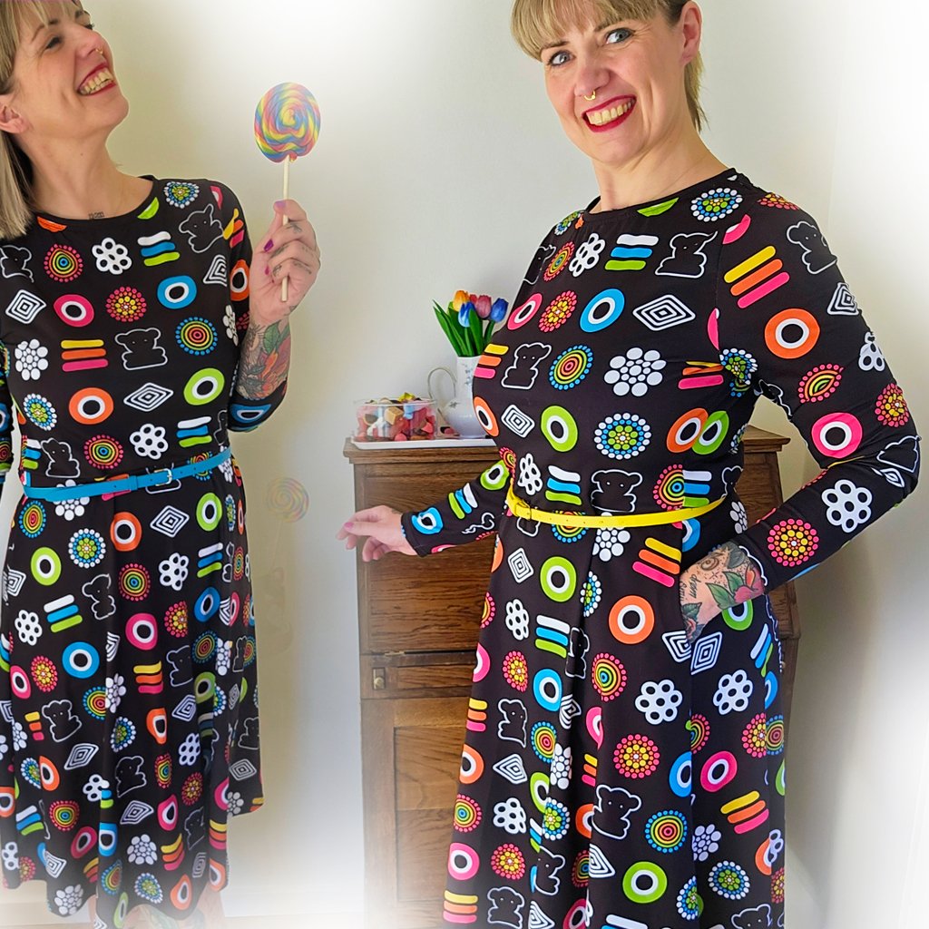Lady in a colorful midi dress by SHALMIAK. Design: SWEET CANDY.