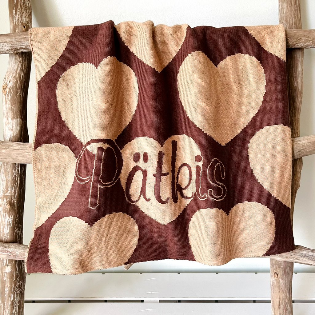 Personalized knitted blanket with hearts