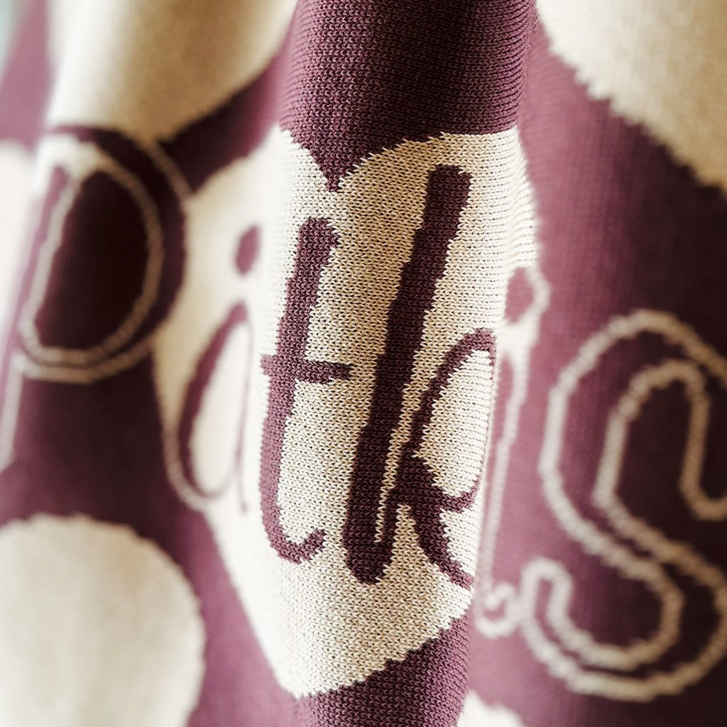 Personalized knitted blanket with hearts