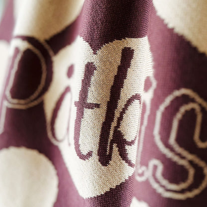 Personalized knitted blanket with hearts