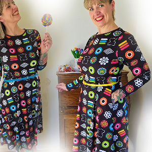 Woman in a colorful midi dress by SHALMIAK. Design: SWEET CANDY.